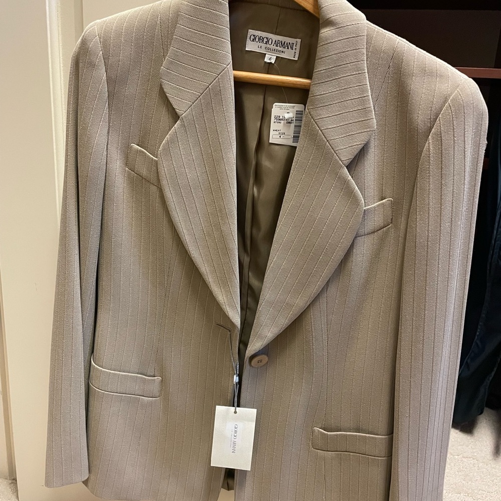 Brand new Giorgio Armani business suit, tags still on.